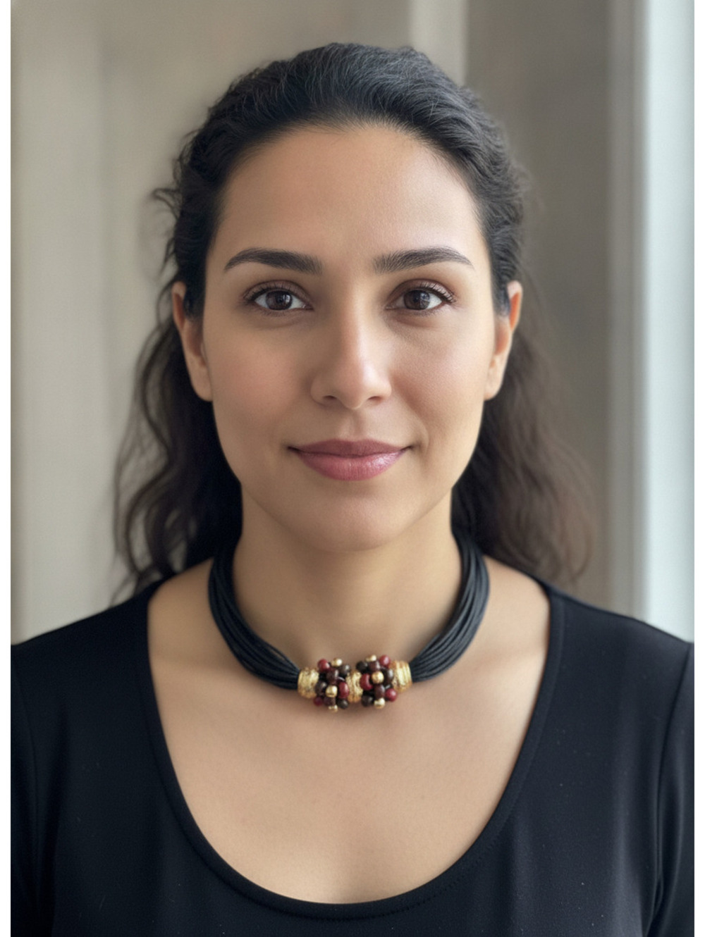 Black leather beaded necklace with gold and red beads